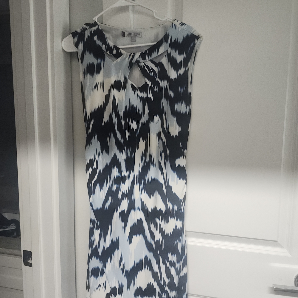 Elegant Black and White Patterned Dress With Some Blue In The Pattern